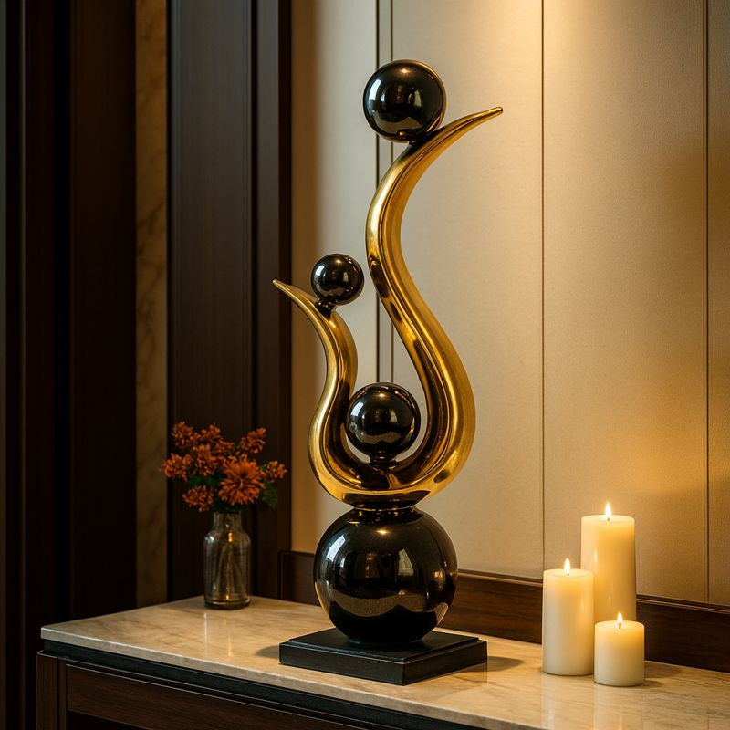 Abstract Sculpture with Rising Spheres Golden