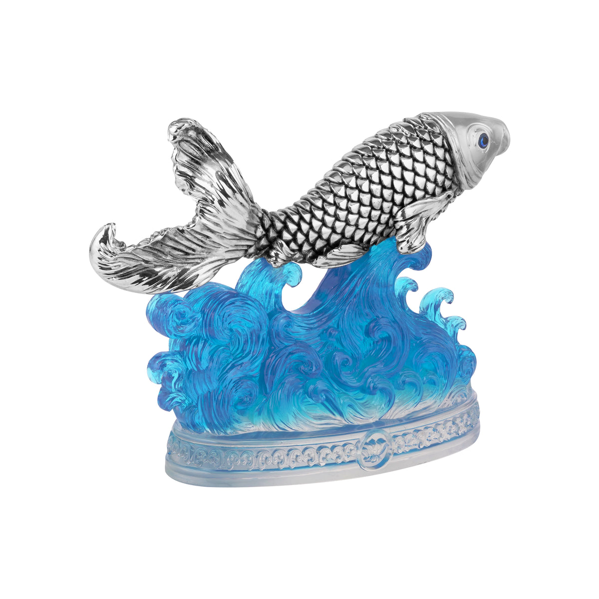 Silver-Plated Fish Figurine on Blue Ocean Waves