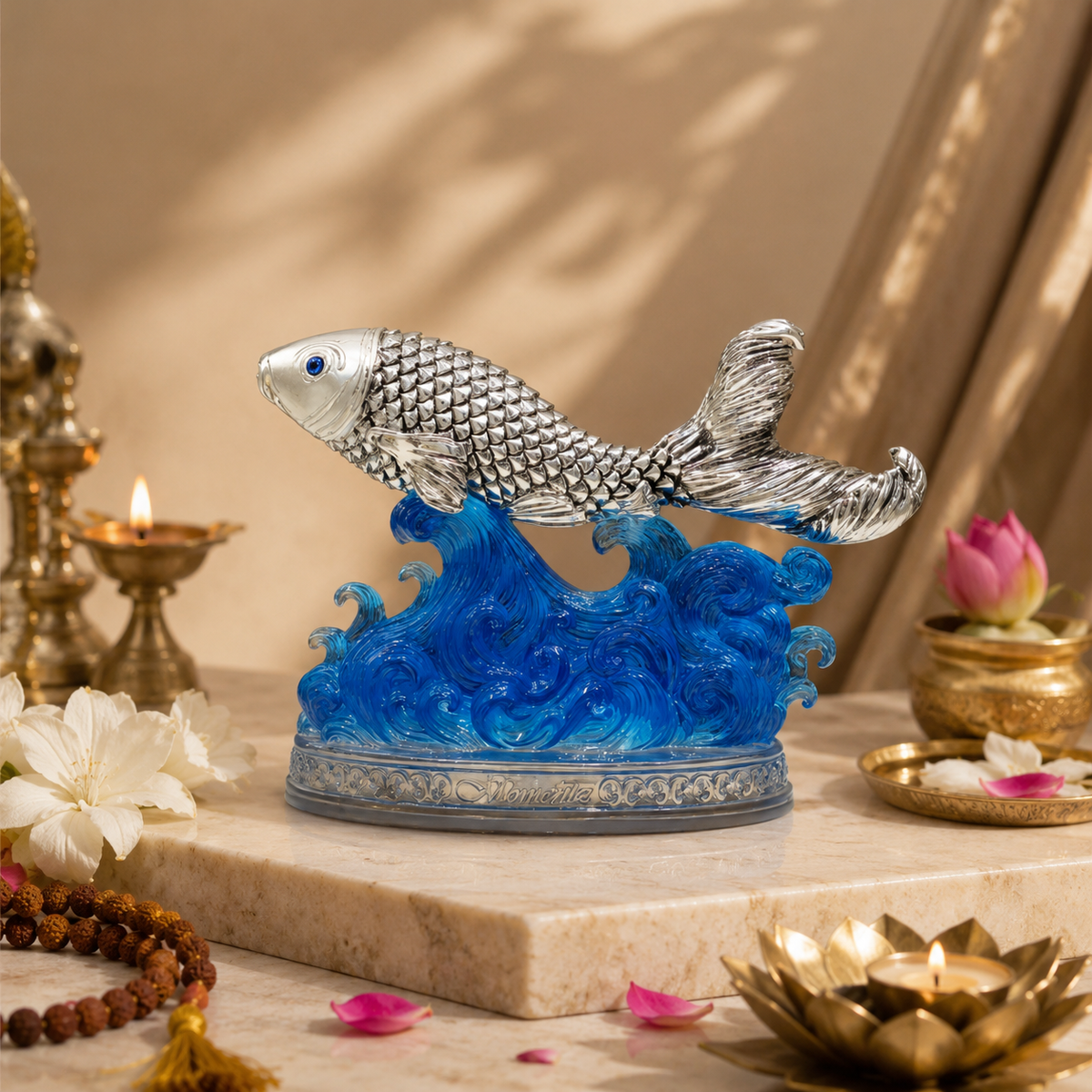 Silver-Plated Fish Figurine on Blue Ocean Waves