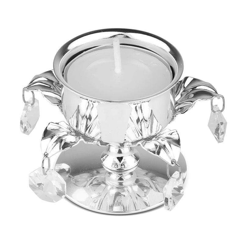 tea light with crystals and leaf